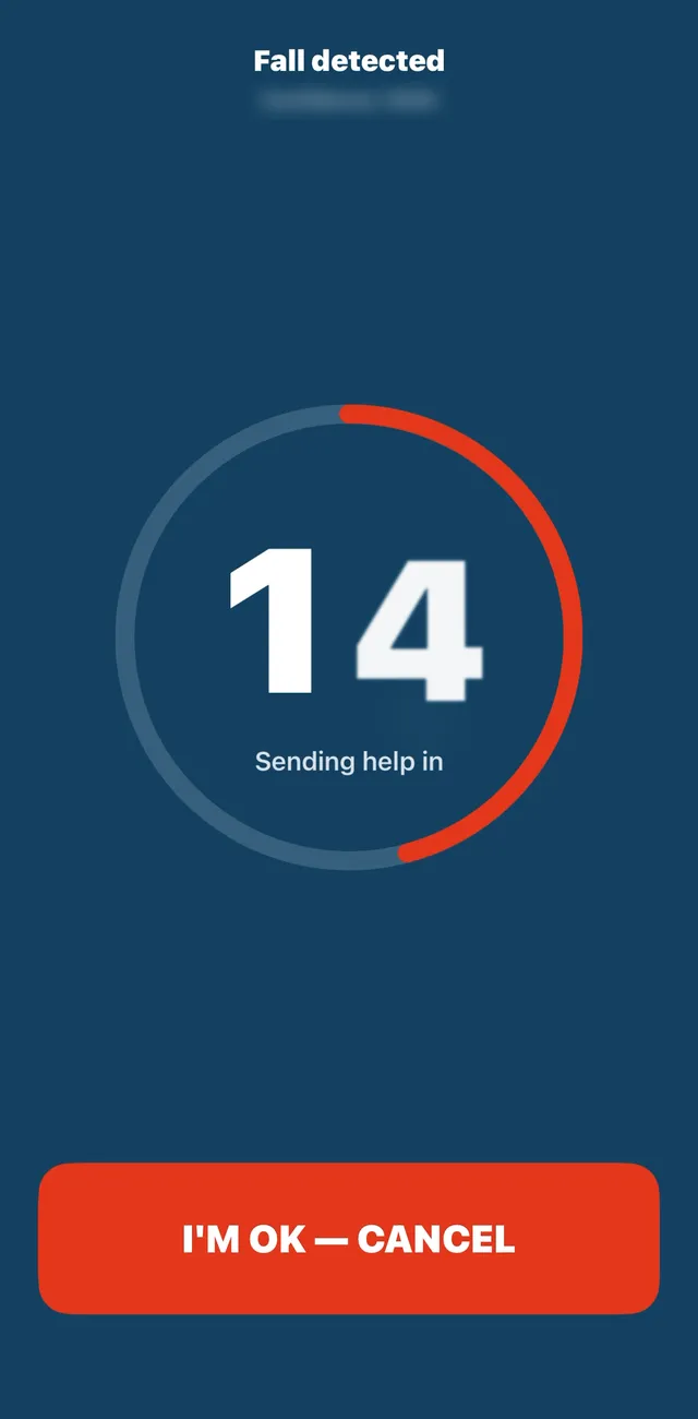 StediGuard fall detected screen with a countdown ring, the words sending help in, and a large I'm OK, cancel button